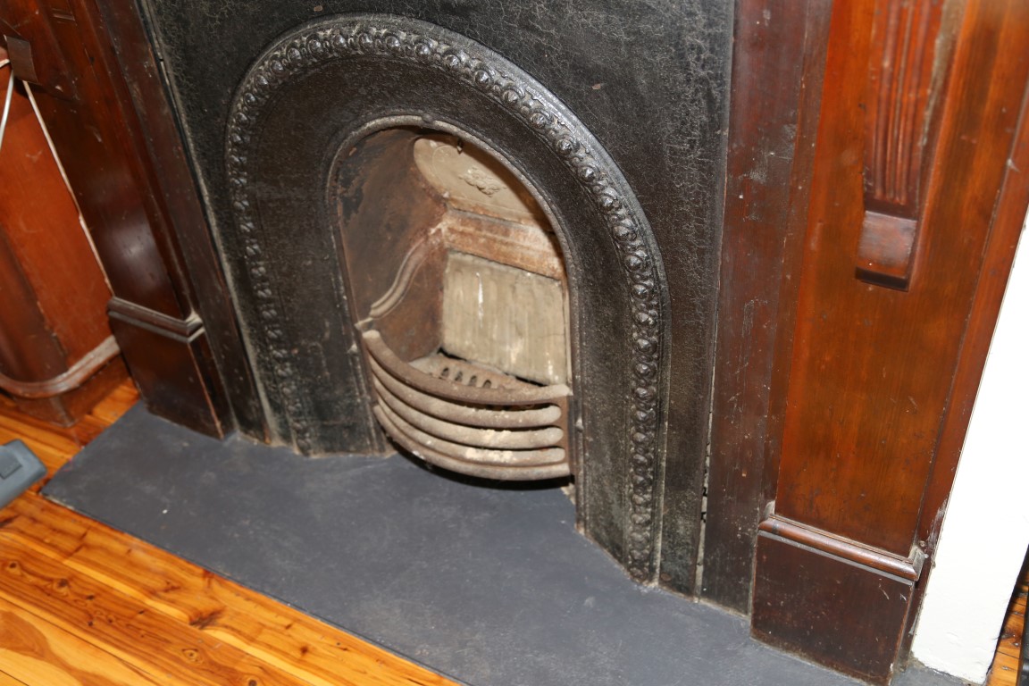 Cast Iron Fireplace with AC Sheeting 