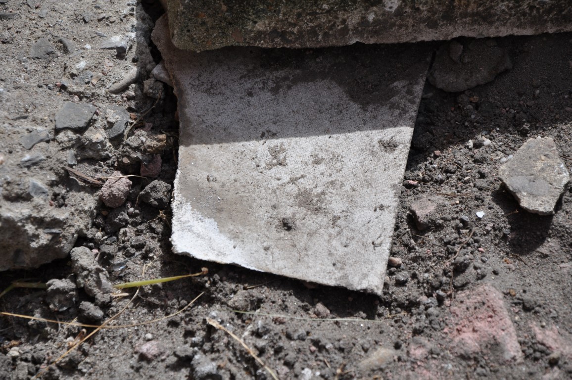 Buried broken AC pieces in garden